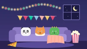 Salón preparado para una fiesta de pijamas con luces, banderines, cojines de animales y palomitas